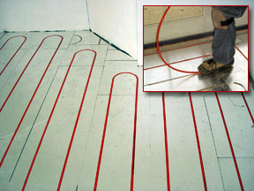 Hydronic radiant floor heating system being installed.
