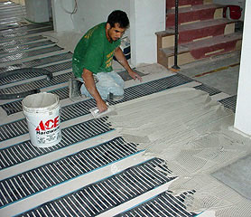 Installing FloorHeat low voltage radiant heating system.