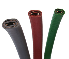 Self-regulating roof deicing heat trace cable.